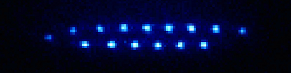 Two-dimensional Coulomb crystal of trapped ions